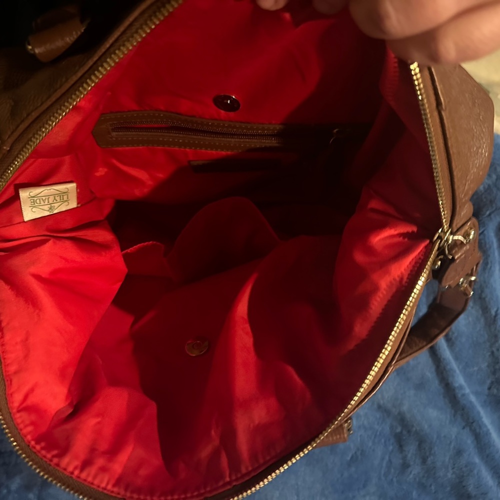 Several large purses, gently used to new.